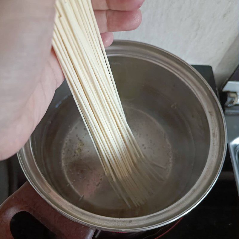 Step 1 Boil the pasta Pasta with runny egg and peanut butter sauce