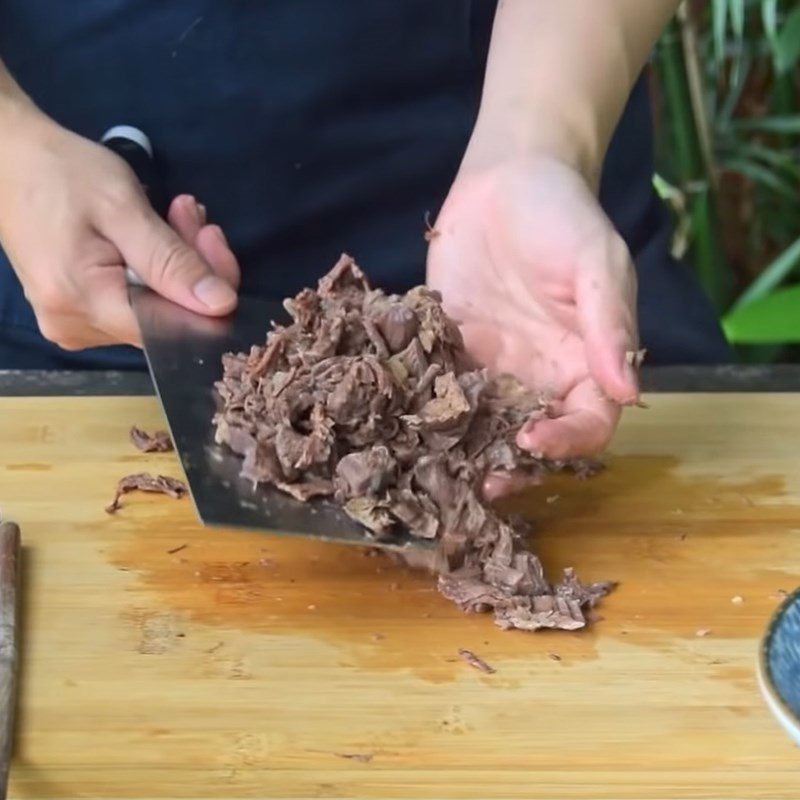 Step 2 Boil the beef and shred it Hot and sour beef soup