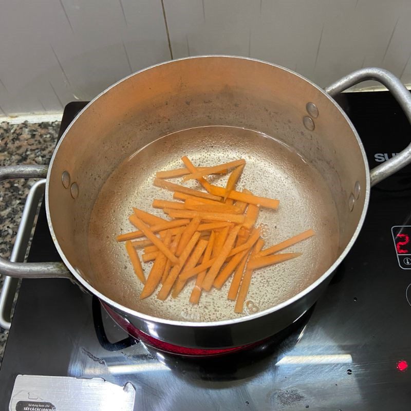 Step 2 Boil pork and carrots Rice paper rolls with boiled meat