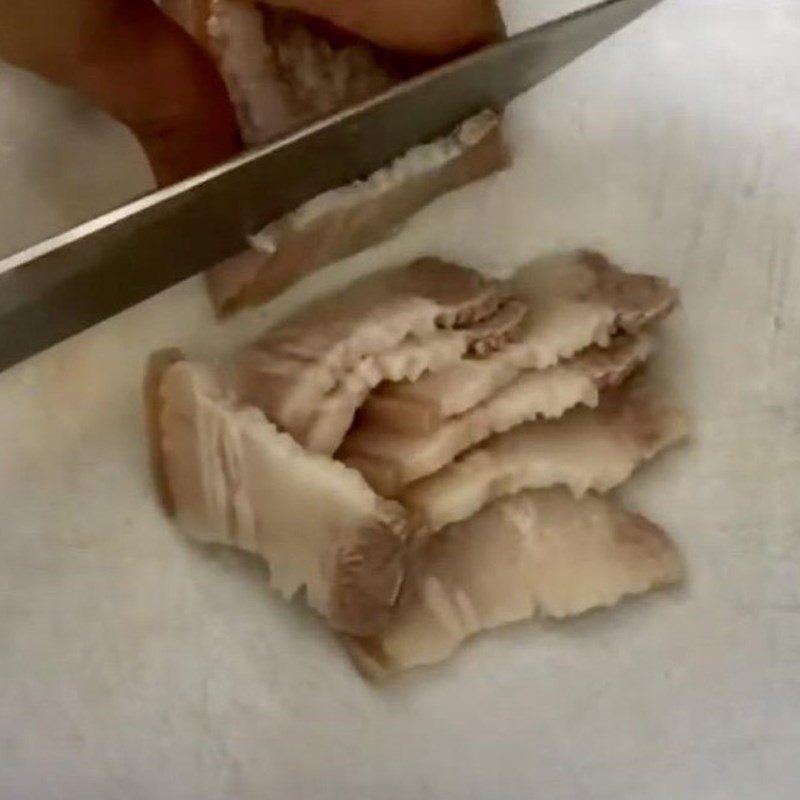 Step 2 Boil the pork and jackfruit for Young Jackfruit Salad