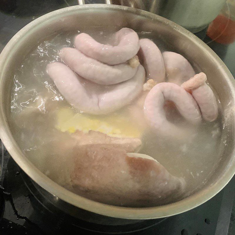 Step 2 Boil the meat, tongue, and pig's entrails Bun dau mam tom