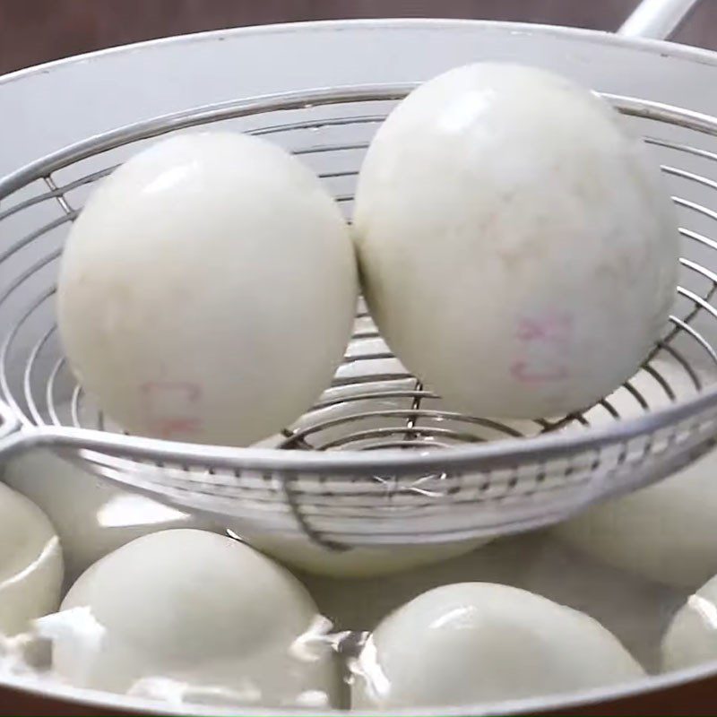 Step 2 Boil eggs Balut with bottle gourd and jute leaves