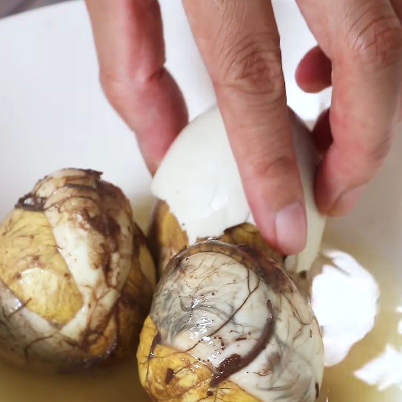 Step 2 Boil eggs Balut with bottle gourd and jute leaves