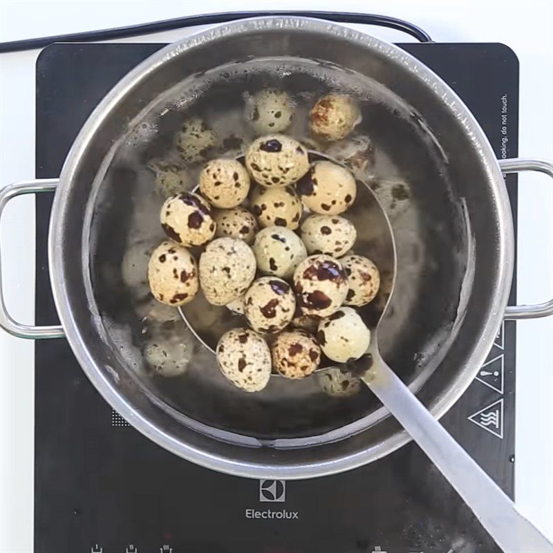 Step 1 Boil quail eggs Fried Quail Eggs with Lemongrass and Chili