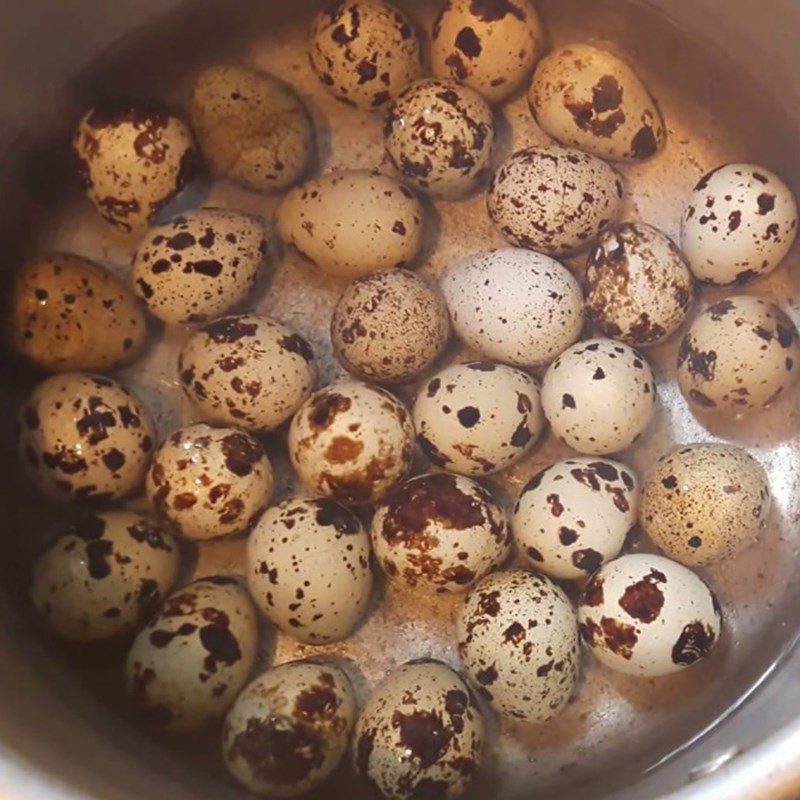 Step 2 Boil quail eggs Fried quail egg balls with sesame