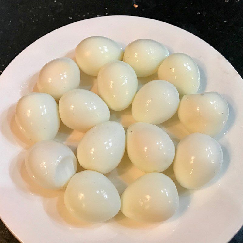 Step 2 Boil quail eggs Fried quail egg balls with sesame