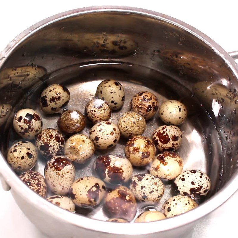 Step 1 Boil and peel the eggs Butter Fried Quail Eggs