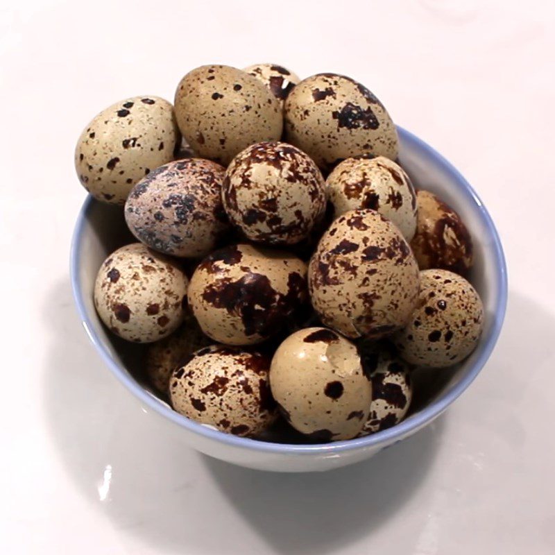 Step 1 Boil and peel the eggs Butter Fried Quail Eggs