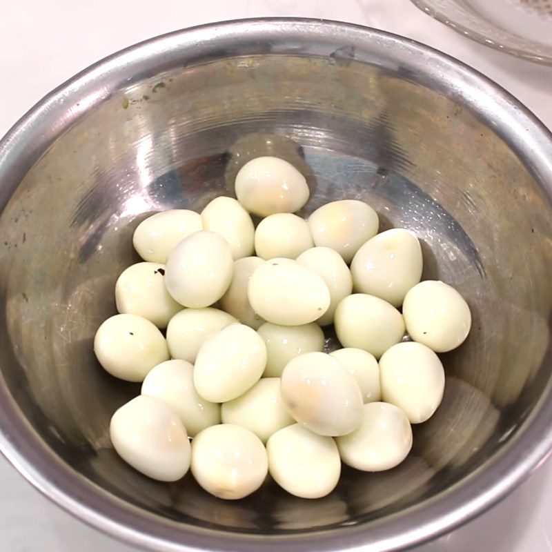 Step 1 Boil and peel the eggs Butter Fried Quail Eggs