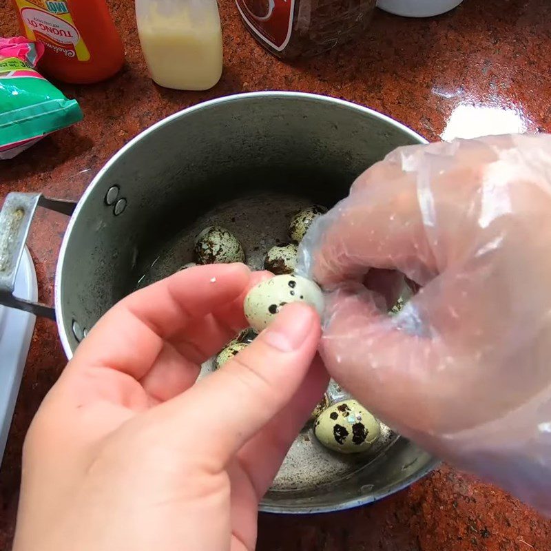 Step 2 Boil and peel the quail eggs for red rice paper wrapped quail eggs