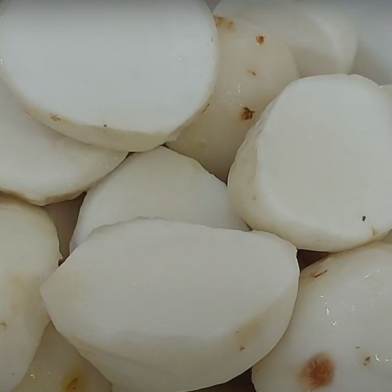 Step 2 Boil and peel taro root for crab soup with water spinach