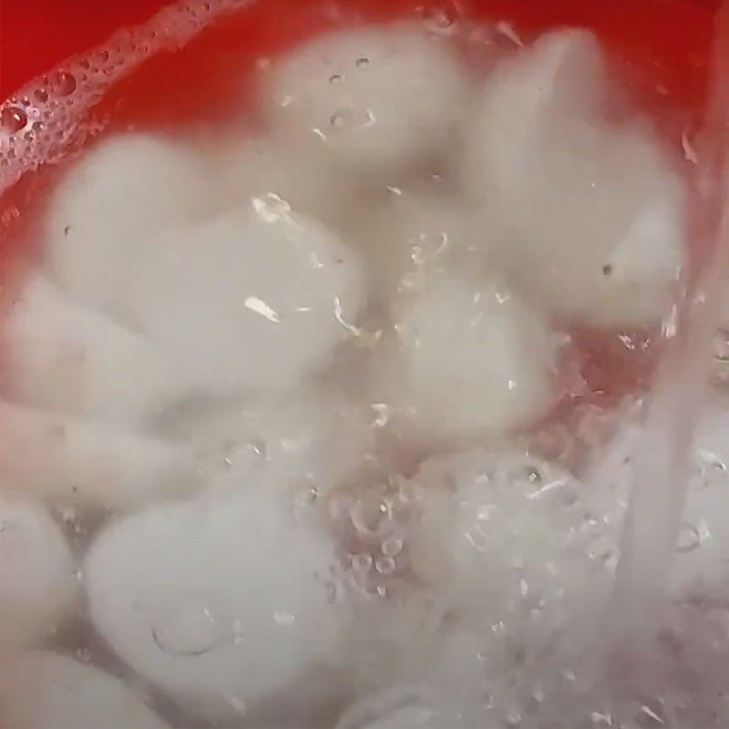 Step 2 Boil and peel taro root for crab soup with water spinach