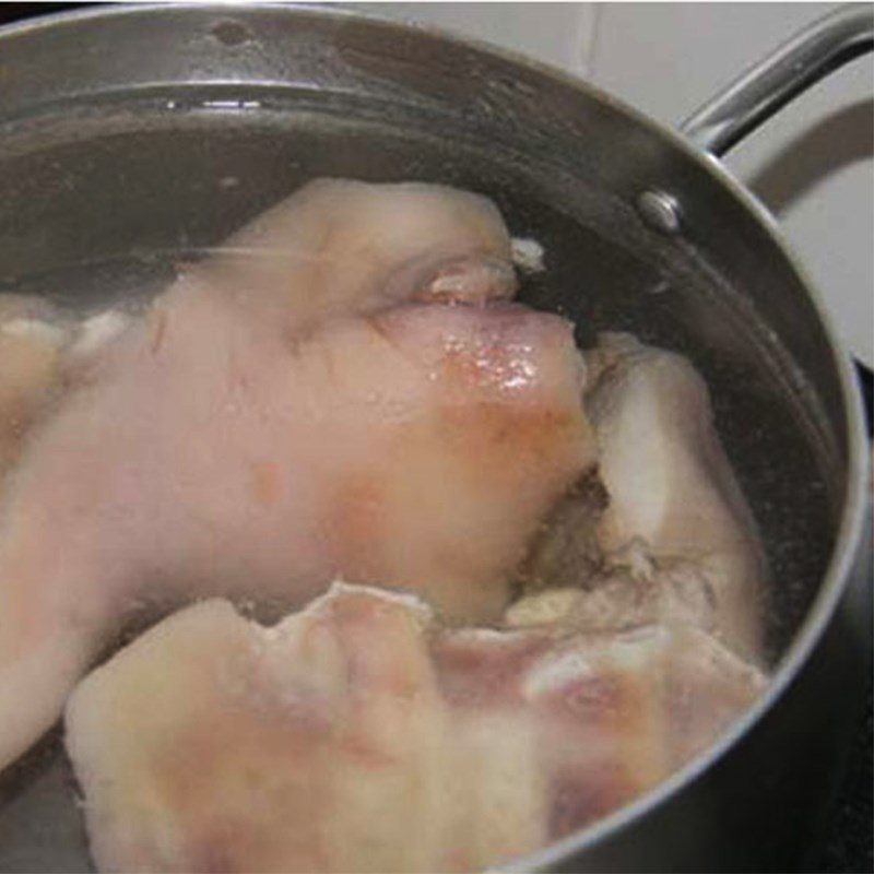 Step 3 Boil and slice the pork ear Pork ear soaked in fish sauce