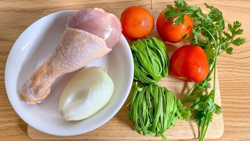 Ingredients for grilled chicken noodle dish with tomato sauce