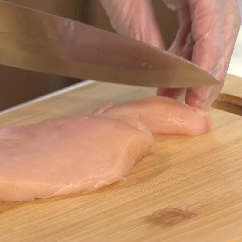 Step 1 Prepare the chicken for Chicken Stir-fried Noodles with Mushrooms