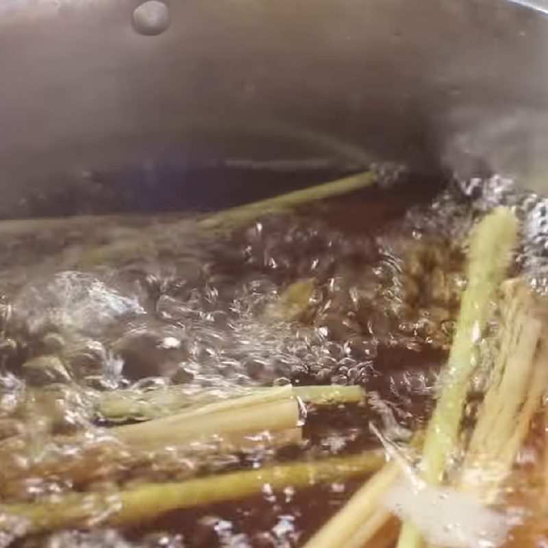 Step 1 Boil the herbs Hoi An Mot Water