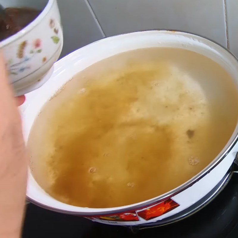 Step 2 Cooking soup Water spinach soup with sour shrimp