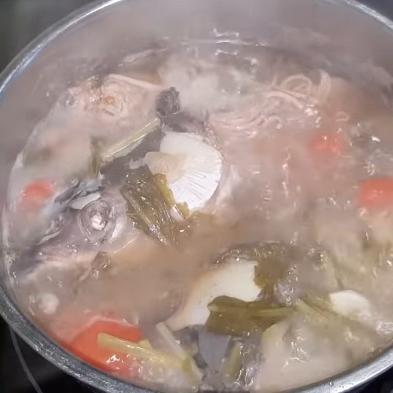 Step 3 Cook the sour melon fish soup