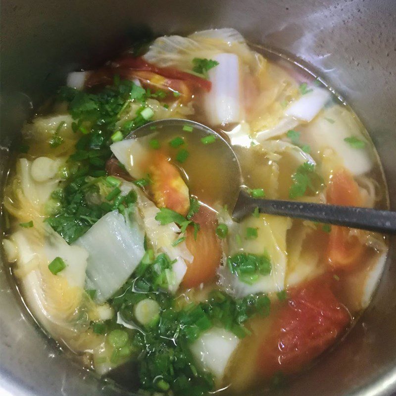 Step 2 Cooking soup Napa cabbage tomato soup