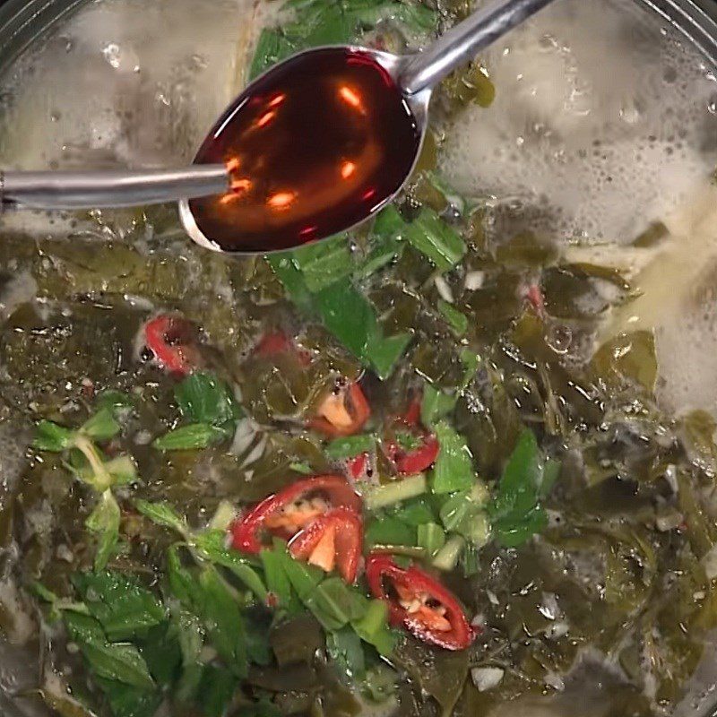 Step 4 Cook the soup Sour frog soup with giang leaves