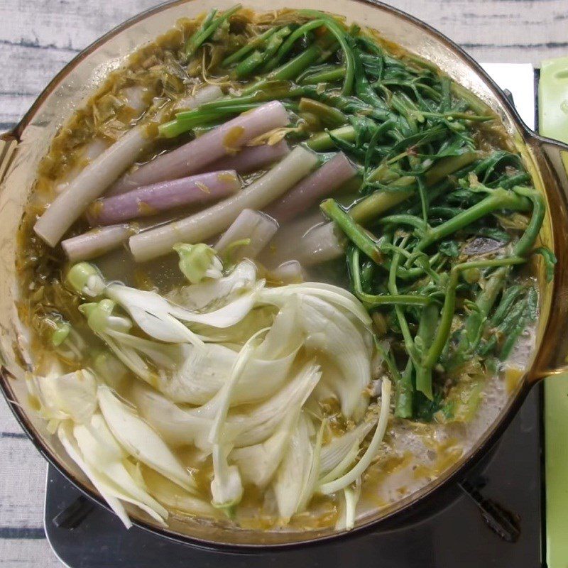 Step 3 Cooking Soup Sour Frog Soup with Young Tamarind Leaves