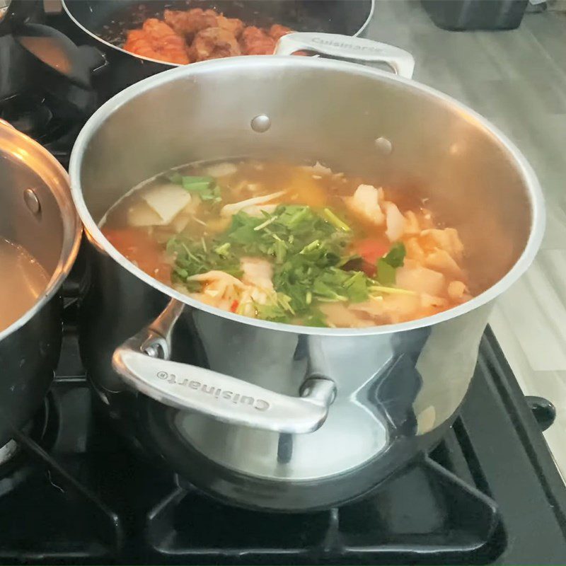 Step 4 Cook the soup Fish with sour bamboo shoots