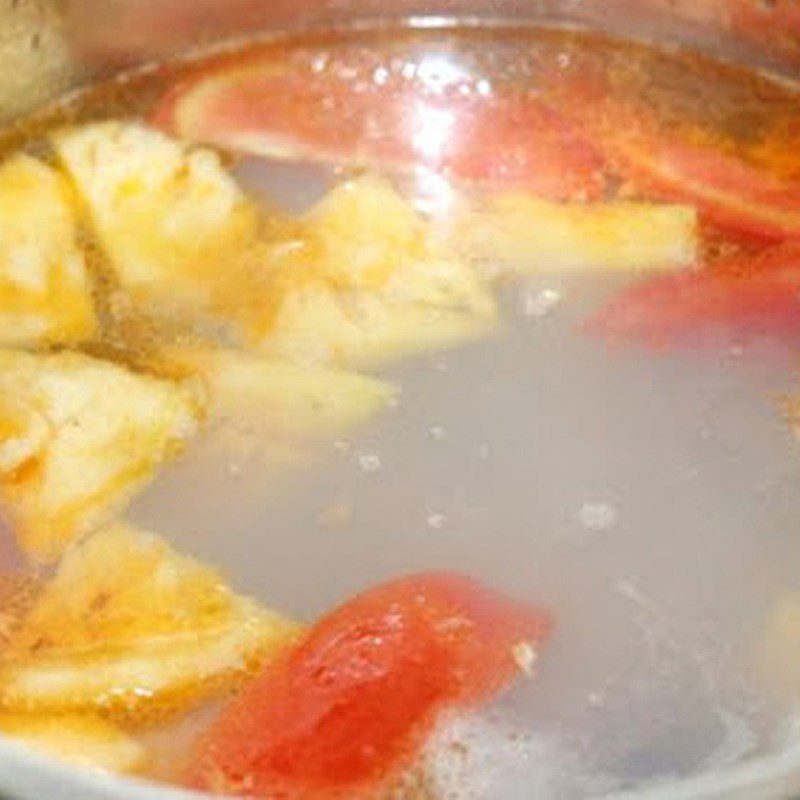 Step 3 Cook the soup for Sour Clam Soup (clams) with water spinach