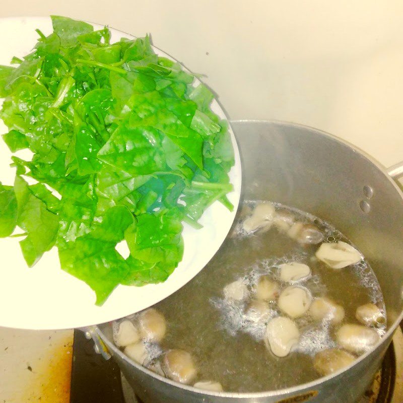 Step 2 Cook the straw mushroom and water spinach soup