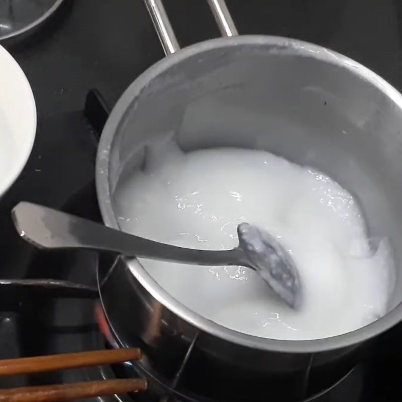 Step 4 Cook the porridge. Goby fish porridge with mustard greens