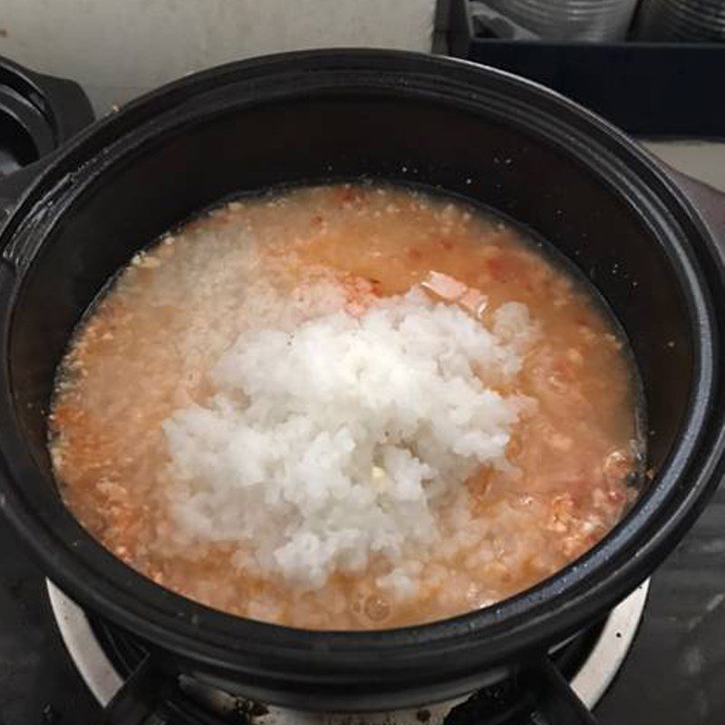 Step 3 Cook the porridge Salmon and soft tofu porridge