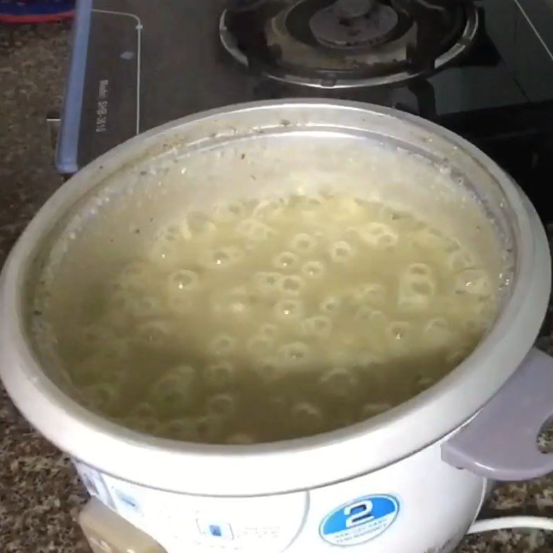 Step 2 Cooking porridge Green bean and pumpkin porridge