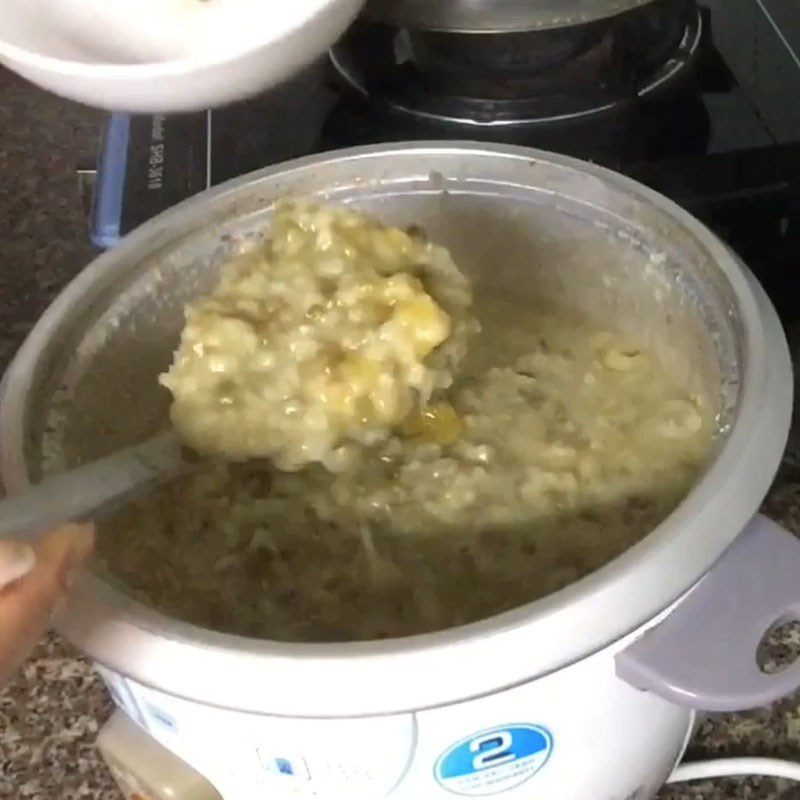 Step 2 Cooking porridge Green bean and pumpkin porridge