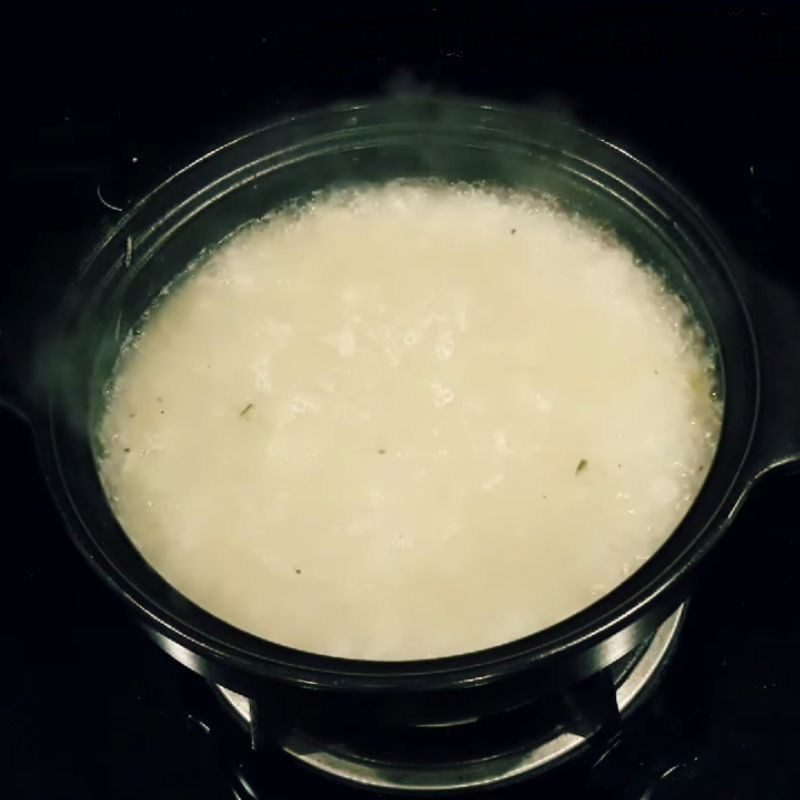 Step 3 Cook the porridge Traditional clam porridge