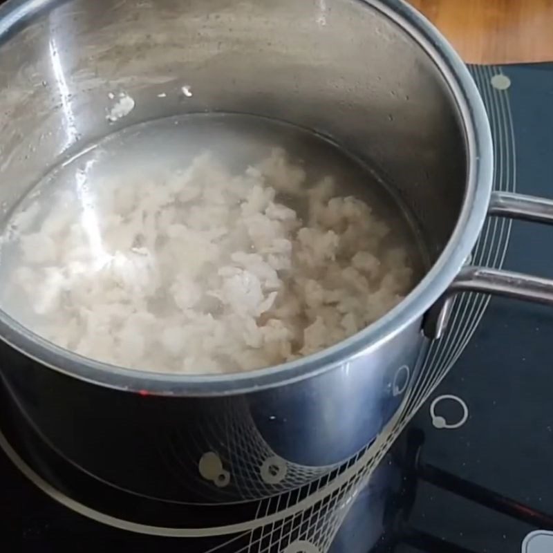 Step 4 Cooking porridge Chicken pumpkin lotus seed porridge