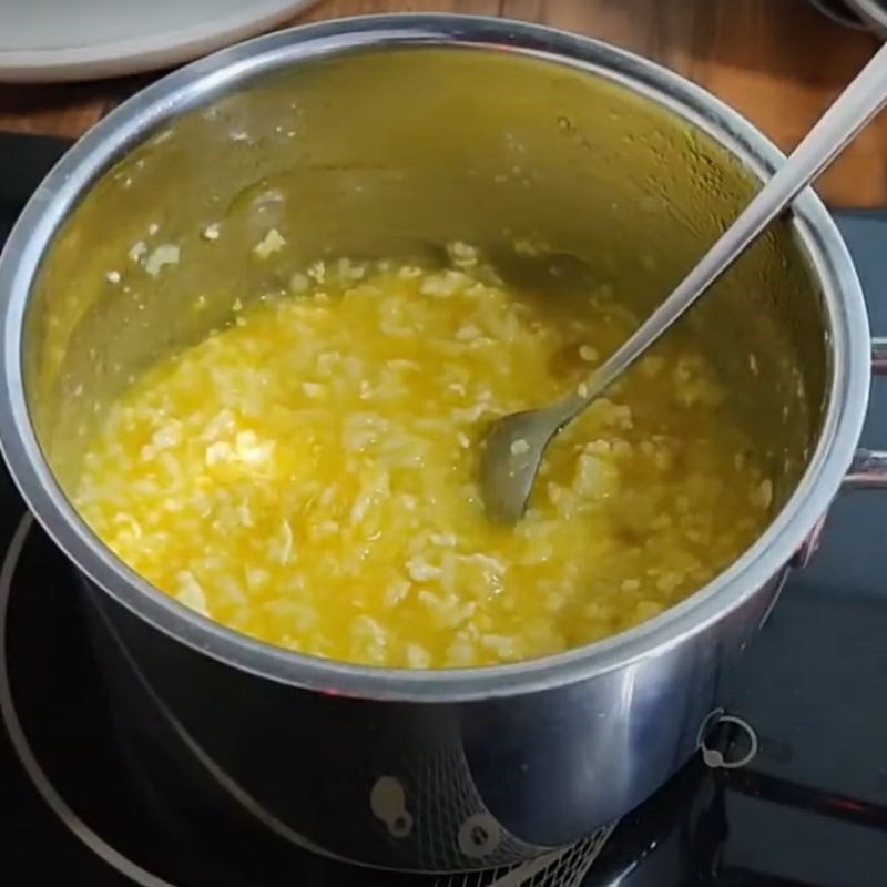 Step 4 Cooking porridge Chicken pumpkin lotus seed porridge