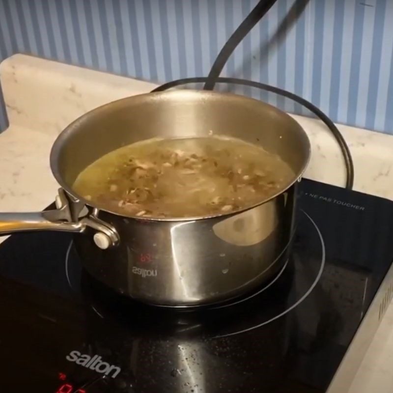 Step 4 Cooking porridge Chicken pumpkin quinoa porridge