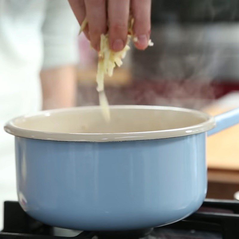 Step 3 Cooking oatmeal porridge with apples Oatmeal porridge with apples and honey