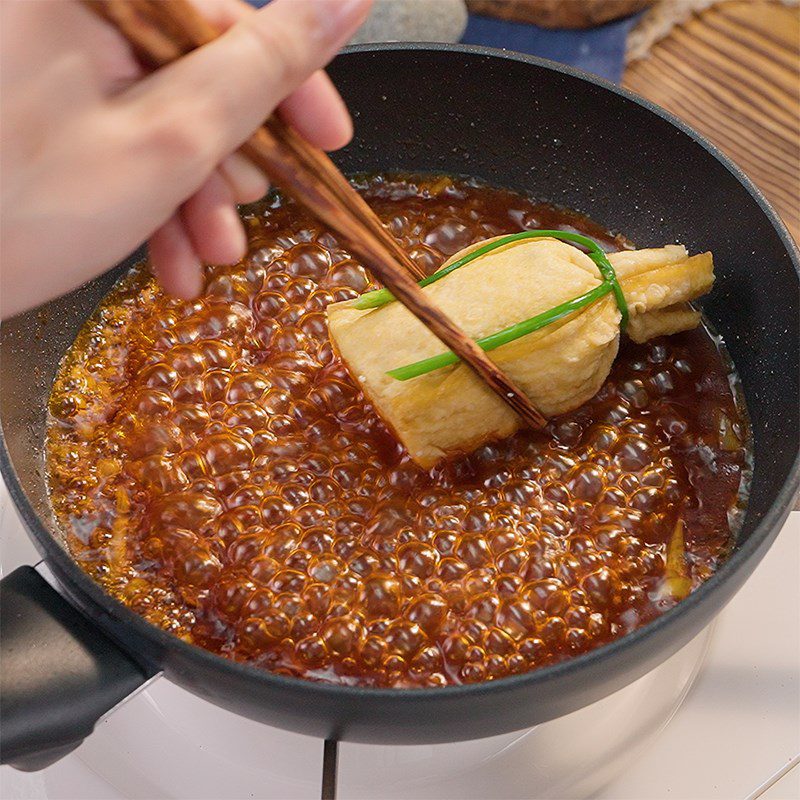 Step 6 Cooking tofu wrapped with plum sauce How to make tofu wrapped with lotus seeds in plum sauce