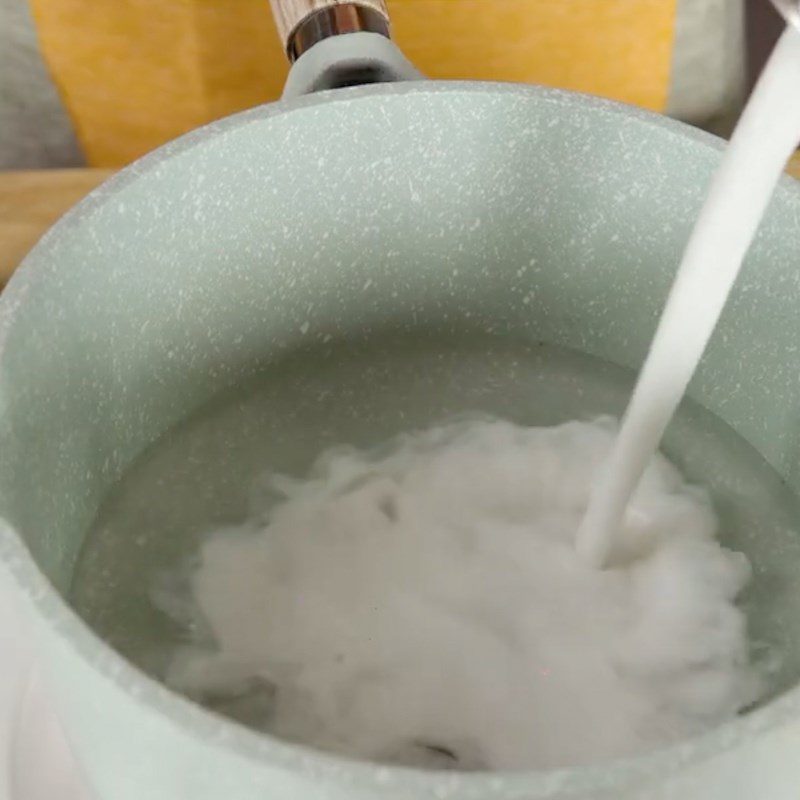 Step 4 Cook the coconut milk mixture for red bean and grass jelly dessert