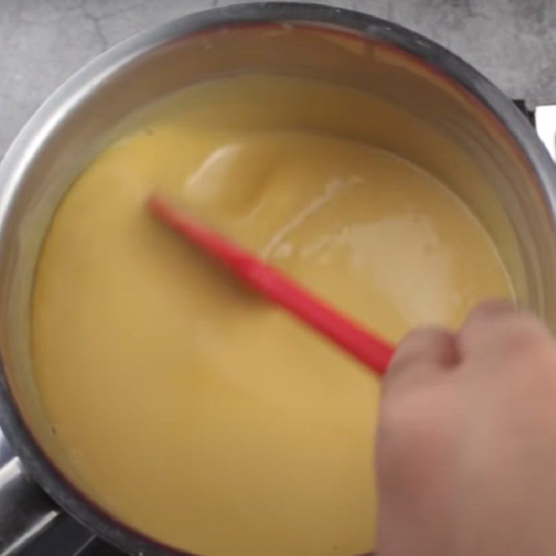 Step 2 Cook the egg milk mixture with gelatin for caramel flan