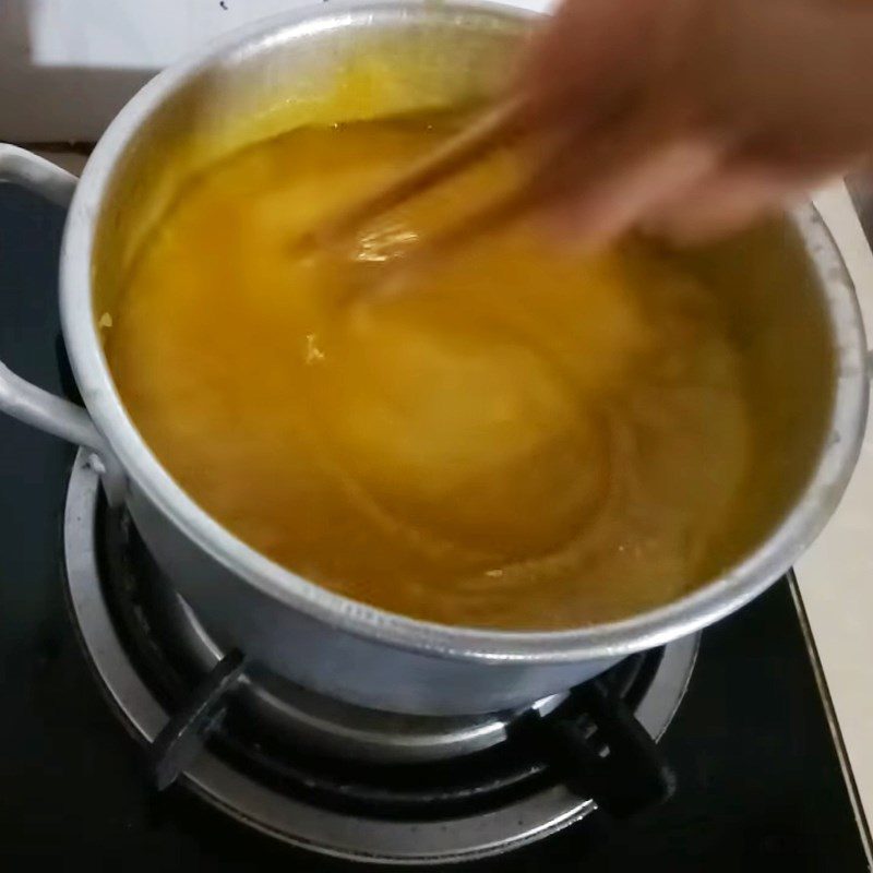 Step 3 Cook the mango mixture for chewy mango cake