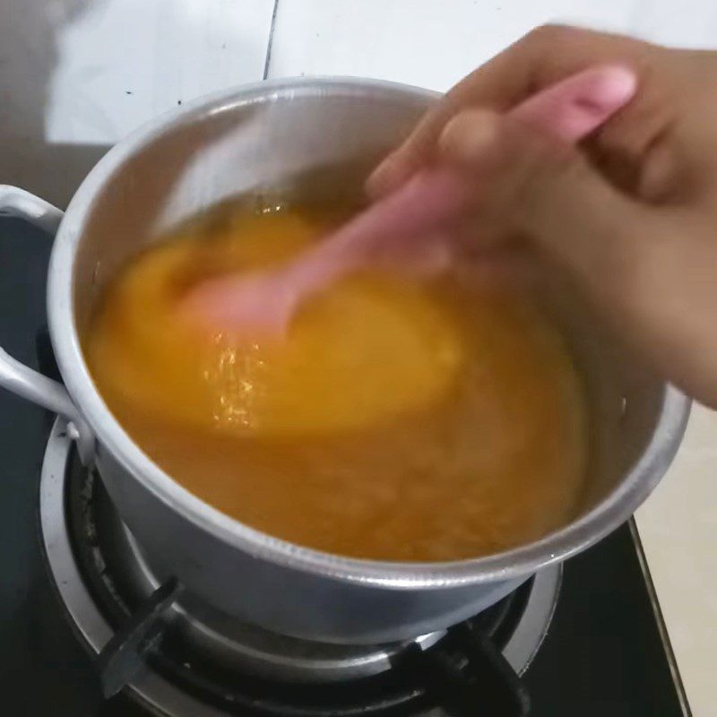 Step 3 Cooking mango mixture Chewy Mango Cake