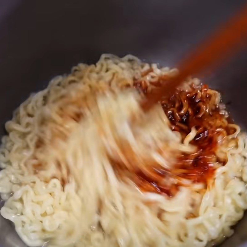 Step 2 Cook spicy Samyang noodles with egg