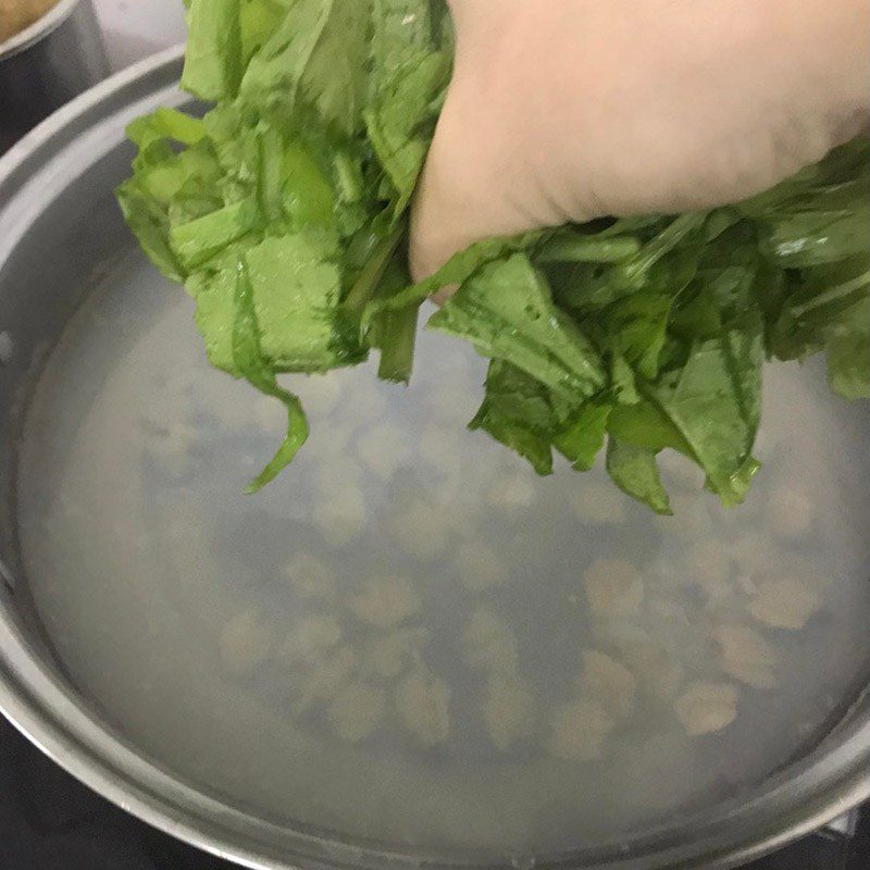 Step 2 Cooking the dish Clam soup with mustard greens (recipe shared by users)