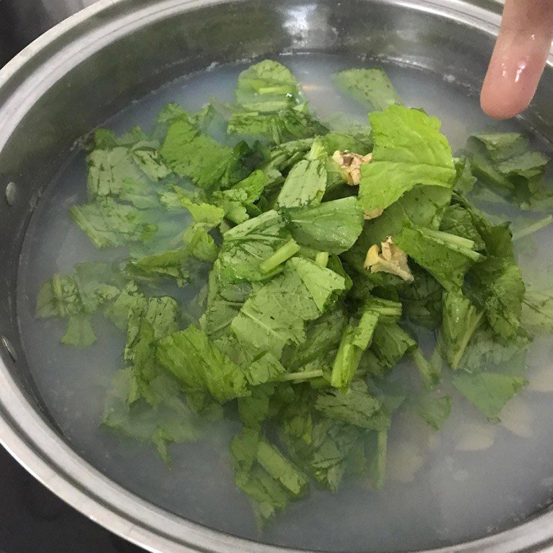 Step 2 Cooking the dish Clam soup with mustard greens (recipe shared by users)