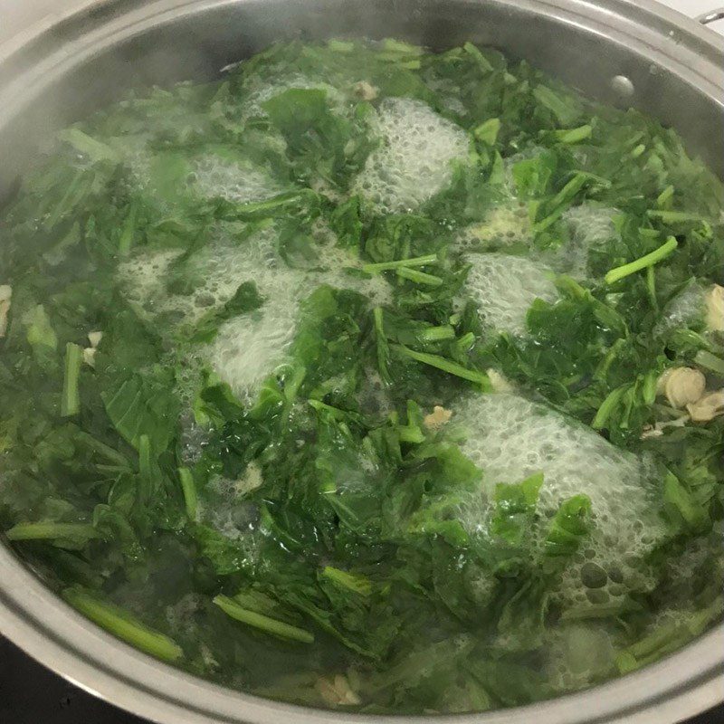 Step 2 Cooking the dish Clam soup with mustard greens (recipe shared by users)