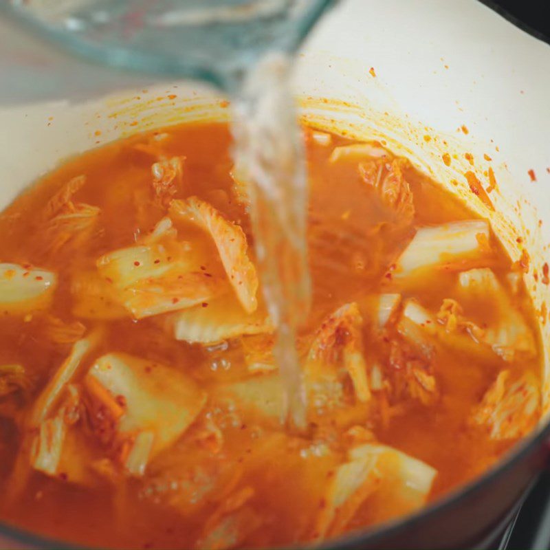 Step 4 Cook kimchi soup with salmon head