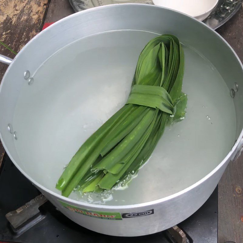 Step 2 Cook coconut water with pandan leaves and rock sugar Coconut water with aloe vera