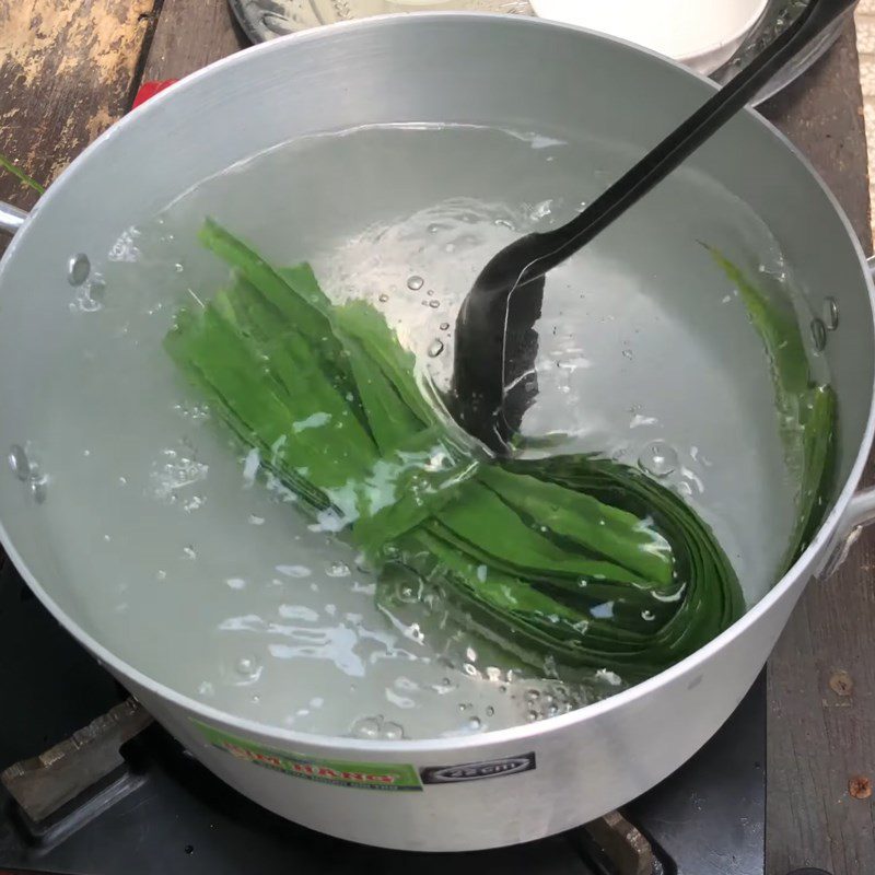 Step 2 Cook coconut water with pandan leaves and rock sugar Coconut water with aloe vera