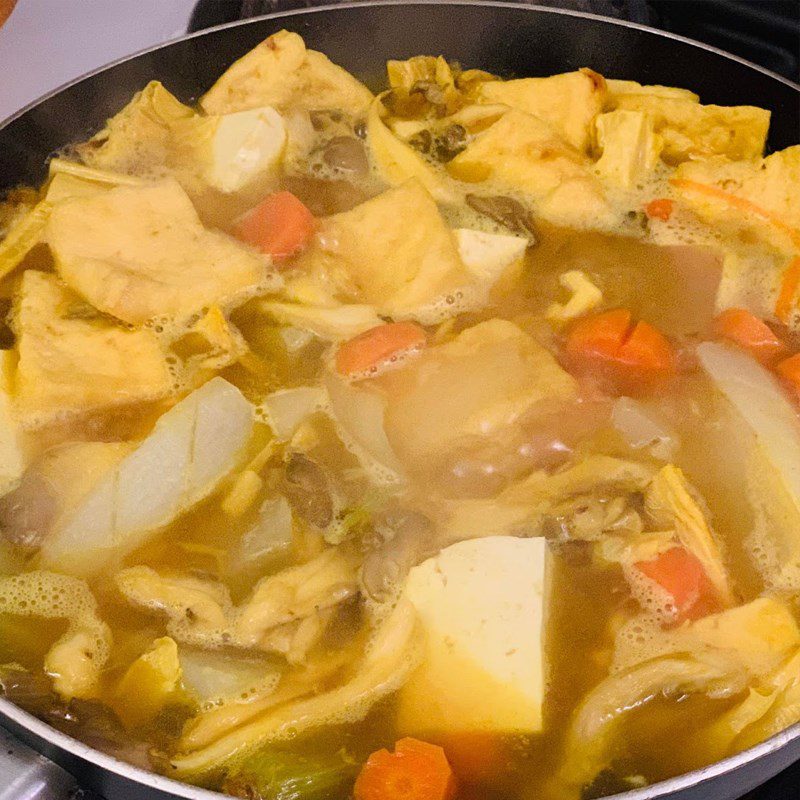 Step 3 Cook the broth for Vegetarian Quang Noodles